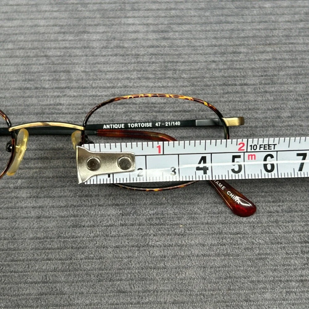 Coast 453 Antique Tortoise Oval Y2k Eyeglasses Frames 47-21-140 Black Gold Metal
